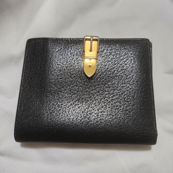 Gucci Handbags - GUCCI Vintage pre-owned conditionleather bi-fold wallet